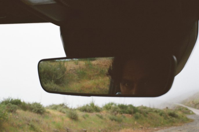 Rear-view mirror on Highway 1