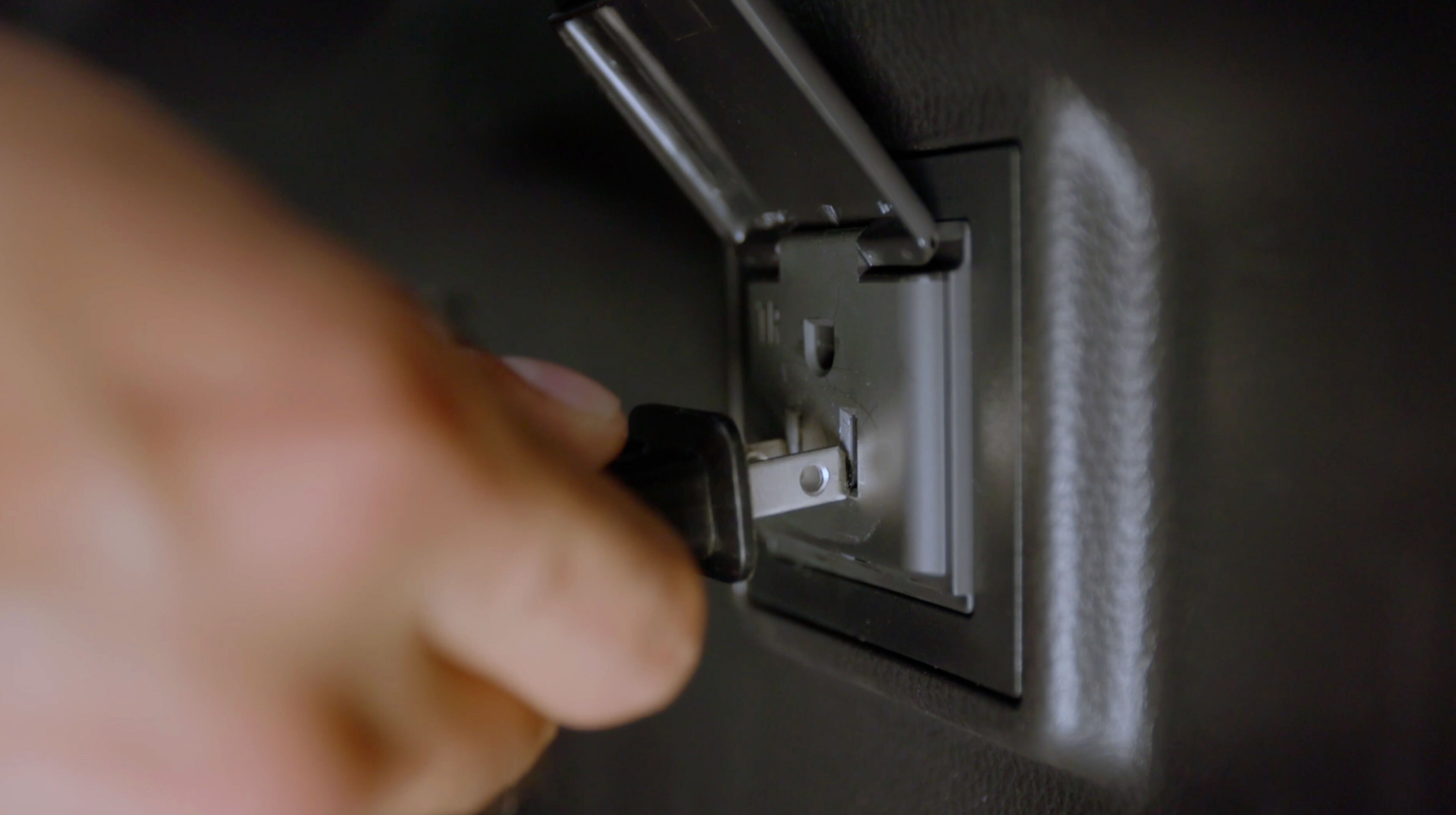 Plugging into the trunk power outlet